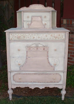 Pink and ivory cabinet-top dresser with splashboard; 1910-1930s.